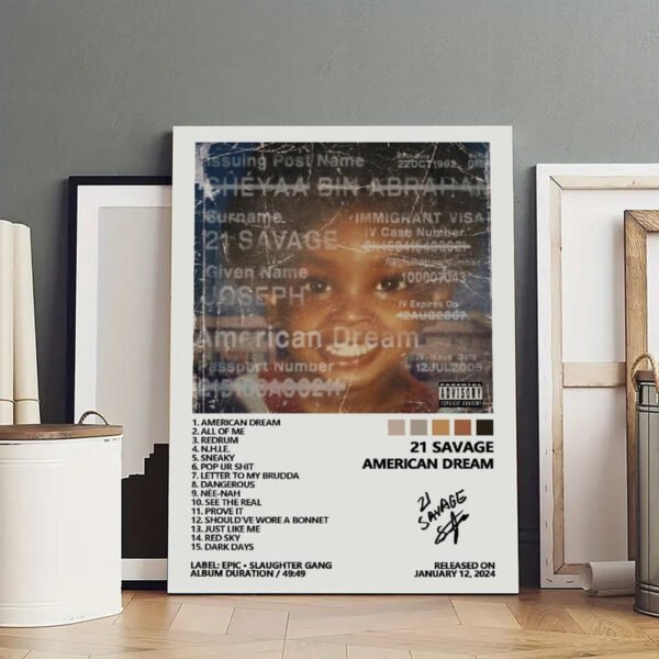 Framed 21 Savage American Dream album poster displayed in modern home interior with gray walls wooden floors showing hip hop wall art as part of contemporary music memorabilia collection for urban home decor enthusiasts.