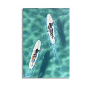 Aerial view canvas art showing two surfers on white surfboards in crystal-clear turquoise ocean waters, perfect for coastal home decor and beach house styling.