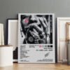 Framed A$AP Rocky AT. LONG. LAST. A$AP album poster with complete 18-track listing displayed in modern minimalist interior setting with wooden floors and neutral decor.