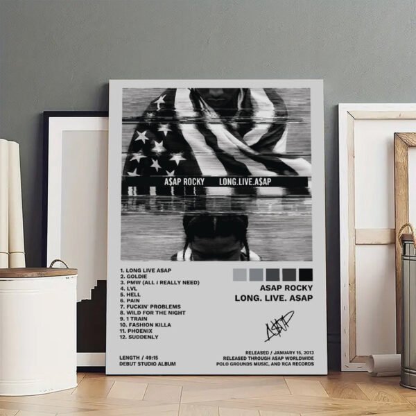 A$AP Rocky LONG.LIVE.A$AP album poster displayed in artist studio with canvases and art supplies