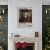 The Black Phone movie poster displayed as wall art above Christmas decorated fireplace mantel in elegant holiday home decor