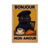 "Bonjour Mon Amour" vintage French poster featuring a sophisticated black cat wearing beret and glasses at café table with coffee and croissant in warm golden tones.