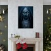Horror wall art featuring demonic nun with glowing yellow eyes displayed above fireplace in Christmas decorated living room