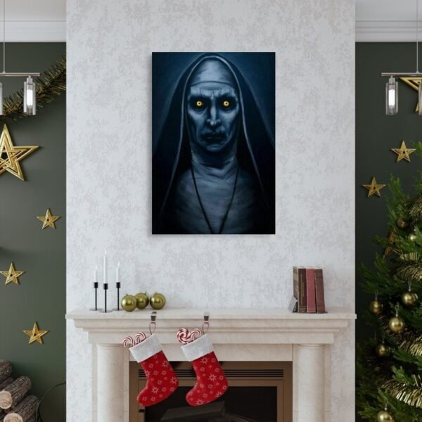 Horror wall art featuring demonic nun with glowing yellow eyes displayed above fireplace in Christmas decorated living room