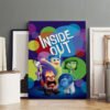 Large Inside Out movie poster displayed in artist studio with white frames and creative workspace setup.