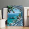 Large Mediterranean coastal canvas wall art print displayed in professional artist studio with premium quality finish