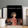 Large Spirited Away canvas print featuring Chihiro displayed in modern minimalist interior with white frames and wooden floors.