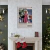 Legally Blonde movie poster displayed above white fireplace mantel with Christmas stockings, gold ornaments, and holiday decorations in elegant green and gold living room interior.