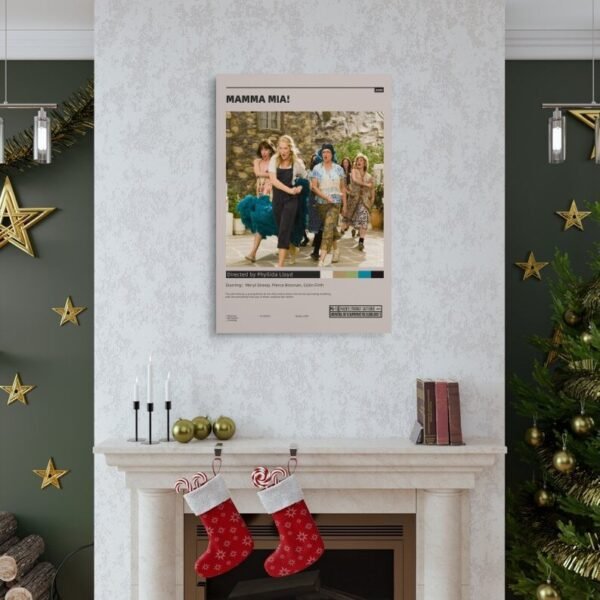 Mamma Mia movie poster displayed above white marble fireplace in elegant living room with Christmas decorations, gold stars, and green accent walls.