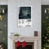 Morgan Wallen Dangerous album poster displayed above Christmas fireplace mantel with holiday decorations and golden stars