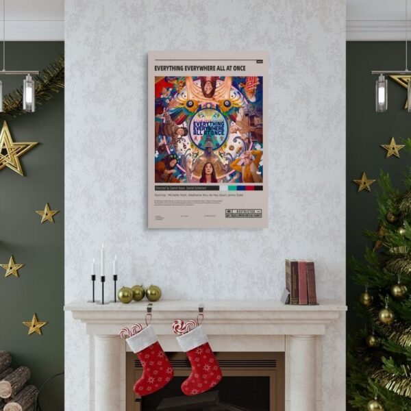 Everything Everywhere All at Once movie poster framed and displayed above Christmas-decorated fireplace mantel in modern living room with holiday decor.