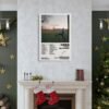 Zach Bryan American Heartbreak album poster displayed above Christmas fireplace mantel with holiday decorations and golden accents