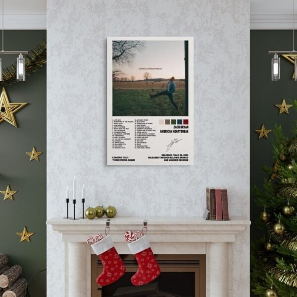 Zach Bryan American Heartbreak album poster displayed above Christmas fireplace mantel with holiday decorations and golden accents