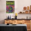 OutKast ATLiens vintage poster displayed in Scandinavian-style kitchen with wood cabinets and modern decor