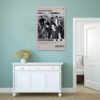 The Outsiders movie poster on sage green wall above white sideboard in minimalist Scandinavian bedroom decor
