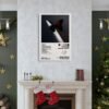Post Malone Twelve Carat Toothache album poster displayed above white marble fireplace in Christmas-decorated living room with holiday decorations.