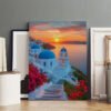 Premium Santorini sunset canvas art featuring blue-domed churches displayed in modern gallery setting
