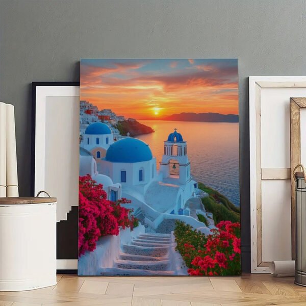 Premium Santorini sunset canvas art featuring blue-domed churches displayed in modern gallery setting