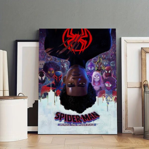 Spider-Man: Across the Spider-Verse poster displayed in professional artist studio setting with frames and canvases showing gallery-quality presentation.