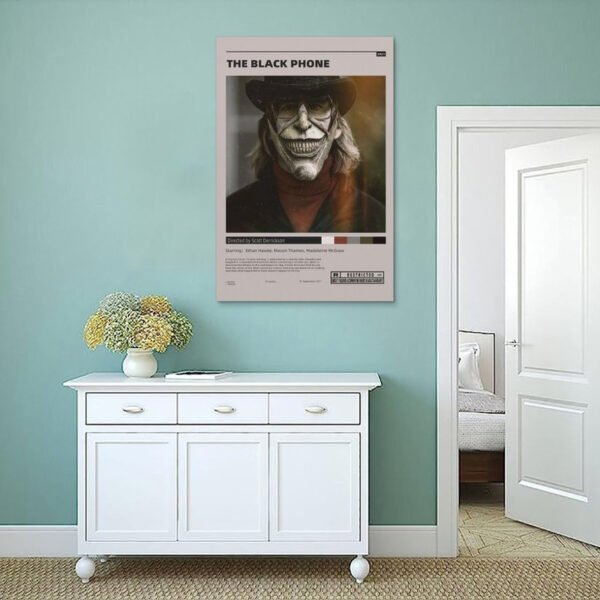 The Black Phone horror movie poster displayed as wall art in modern mint green living room with white furniture and home decor.