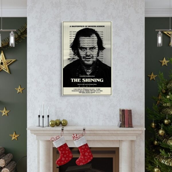The Shining movie poster displayed above fireplace in elegant Christmas-decorated living room