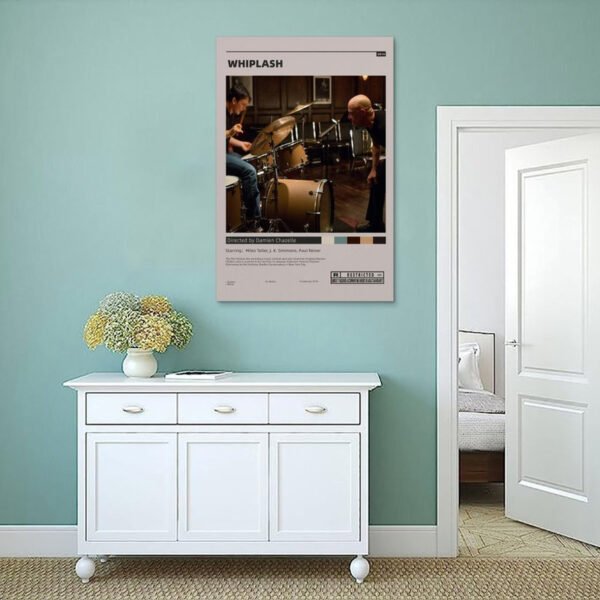Whiplash movie poster displayed on mint green wall above white classic sideboard in coastal Scandinavian style interior