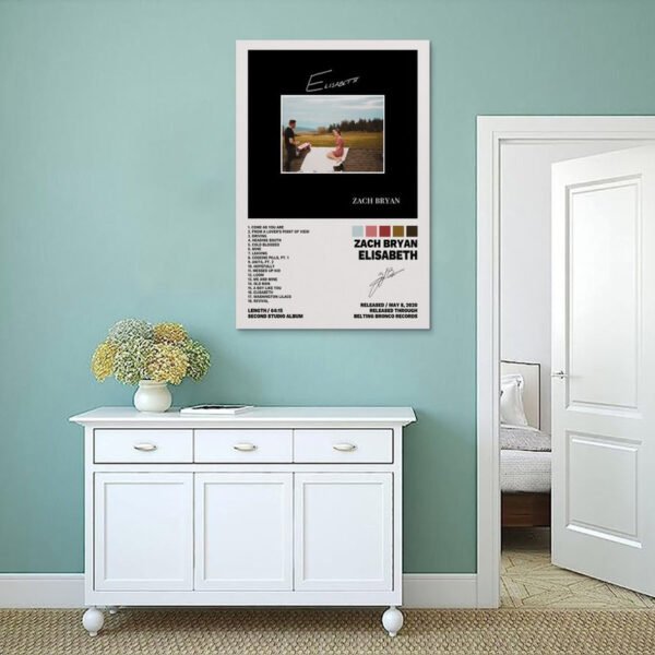 Zach Bryan Elisabeth album poster displayed in mint green Scandinavian-style bedroom above white vintage sideboard with dried flowers